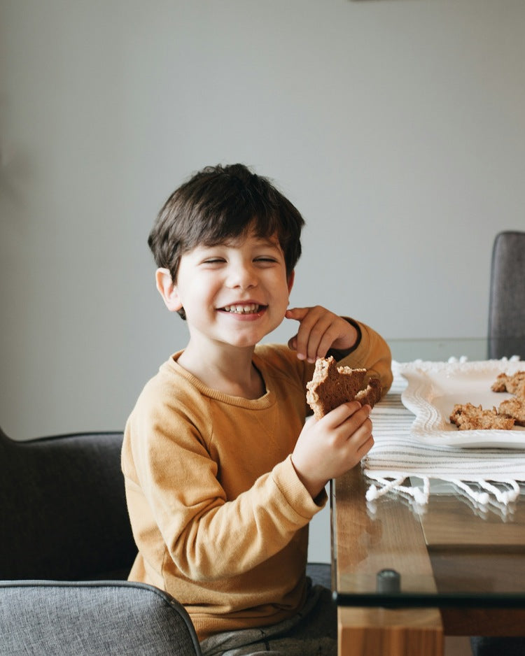 enfant qui mange collation à l'avoine Vitali-T